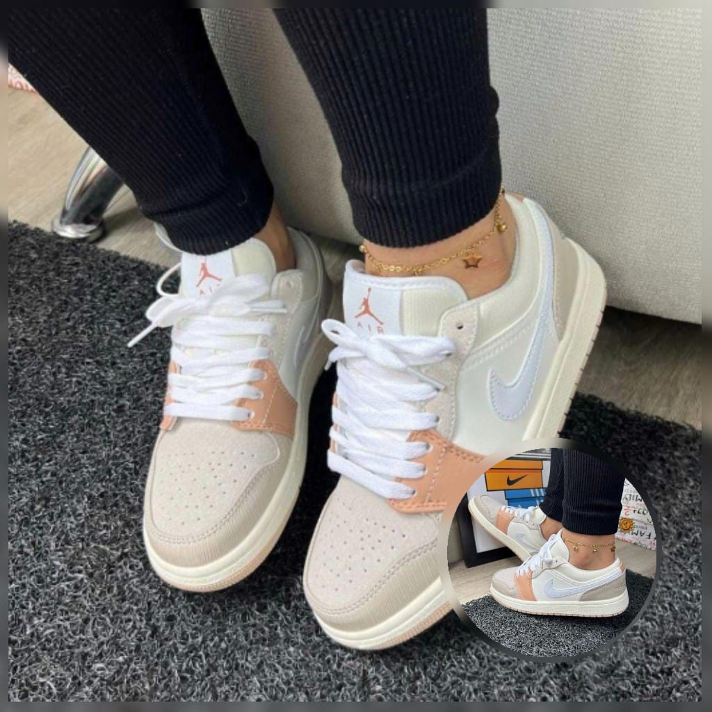 Zapatos de moda Nike Jordan de la marca Taboada, vista frontal con detalles en colores vibrantes y diseño moderno.
