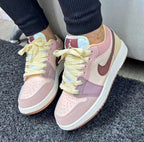 Zapatos de moda Nike Jordan de Taboada, vista lateral mostrando el diseño y color característico de la marca.