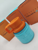 Perfume Armaf Mandarin Sky de 100 ml, frasco elegante, con notas cítricas y aromáticas, ideal para ocasiones especiales.