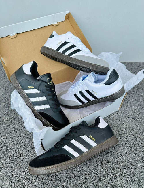 Zapatillas Adidas Samba de Tula, calzado de moda en color negro con detalles en blanco y suela de goma.