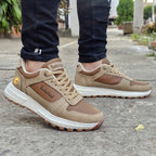 Zapatos Timberland de moda Taboada, vista lateral mostrando detalles de diseño y color en un ambiente neutro.