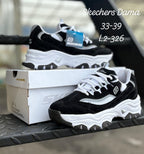 Ropa deportiva Skechers Valkyrie, conjunto cómodo y transpirable para entrenamiento, en colores vibrantes y diseño moderno.