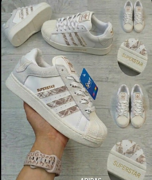 Ropa deportiva Adidas Superstar Arcoiris de la marca Valkyrie, en colores vibrantes y diseño moderno, vista frontal.