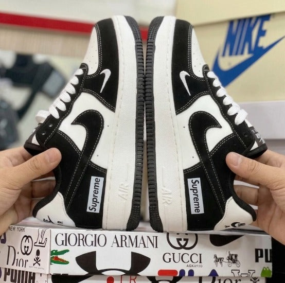 Ropa deportiva Valkyrie con diseño de Nike Air Force One en estilo boceto y pintura, en colores negros y blancos.