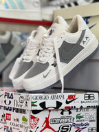 Ropa deportiva Valkyrie con diseño de boceto de Nike Air Force One, en tonos blancos y negros, estilo artístico y moderno.