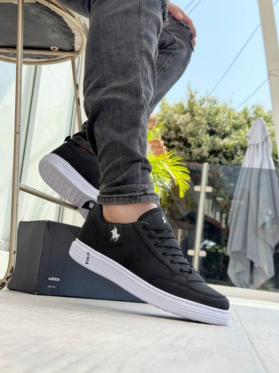 Tenis polo negro caballero 